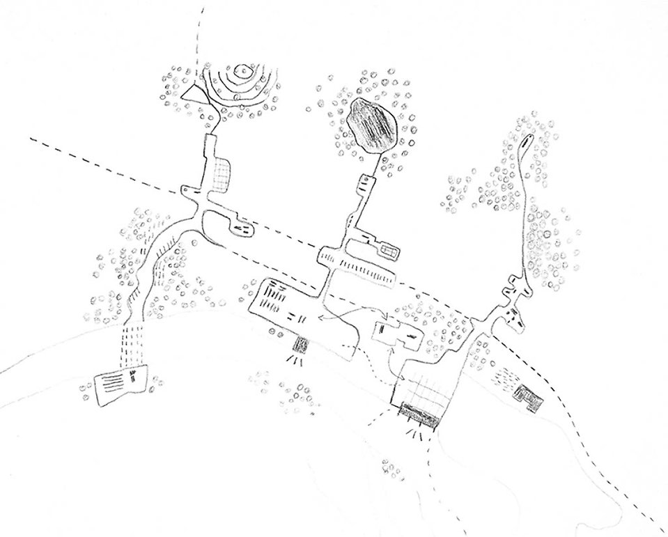 Översiktsbild av området som visar husens formationer och hur skog och natur omsluter området